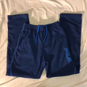 blue fila track pants/ sweatpants